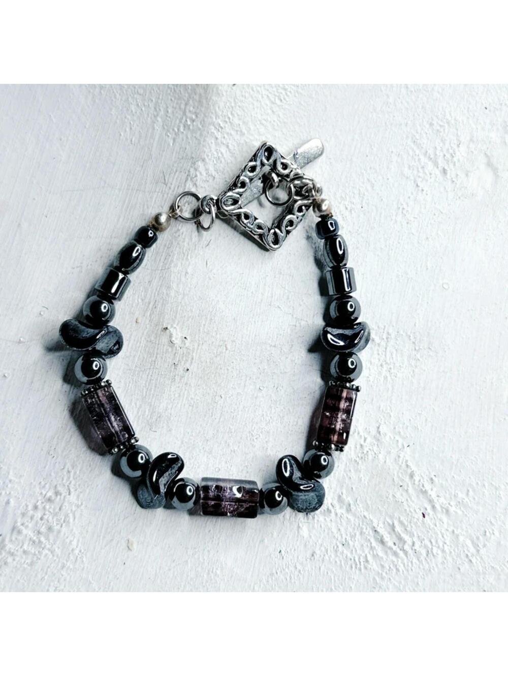 7580u. Hematite Bracelet Purple Accents